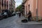 An unknown musician plays the guitar in the center of Lviv.