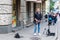 An unknown musician plays the guitar in the center of Lviv.
