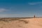 Unknown person looks into the moon landscape near Swakopmund  Namibia