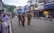 Unknown policemen, looking around the center road in the center of city, Sri Lanka