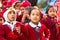 Unknown pupils during dance lesson in primary school.