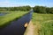 Unknown visitors in the sightseeing boating trip in a canal in Giethoorn., Netherlands