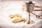 Unleavened bread, chalice of wine, silver kiddush wine cup on canva background. Communion still life. Christian communion concept