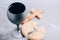 Unleavened bread, chalice of wine, wooden cross on grey background. Christian communion for reminder of Jesus sacrifice. Easter