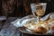 Unleavened bread with silver chalice of wine. Christian communion concept for reminder of Jesus sacrifice. Generative AI