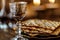 Unleavened bread with silver chalice of wine. Christian communion concept for reminder of Jesus sacrifice. Generative AI.