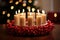unlit candles placed in a christmas-themed candle holder
