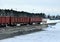 Unloading of crushed stone a railway car of a dump truck, closeup. Unloading bulk cargo from railway wagons