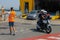 Unloading passengers and vehicles from ferry boat in seaport