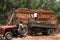 Unloading and stacking mud bricks