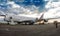 Unloading wide body cargo aircraft