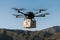 Unmanned aircraft system drone carries blank package in the air