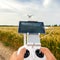 Unmanned copter. Man controls quadrocopter flight.