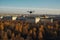 Unmanned military drone flies in the sky over Moscow , 3d rendering. Concept: combat strike drone, aerial attack on Kremlin,