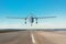 Unmanned military drone landing on runway military base