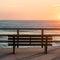 Unoccupied bench offers serene ocean view on pier