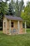 Unpainted backyard playhouse