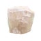 Unpolished pink fluorite rock cutout on white