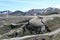 Unreal barren  valley around Laki volcano with partly snow capped mountain range, Iceland