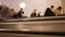 Unrecognisable metro passengers on an escalator. People with blurry faces rise