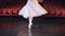 Unrecognised ballerina turning around. Close-up. Slowmotion.