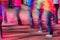 Unrecognised group of people dancing on a stage. Blurred motion of dancers