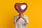 Unrecognizable Afro Woman Hiding Face Behind Heart Shaped Balloon