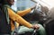 Unrecognizable Black Muslim Lady In Hijab Driving Car, Holding Gear Shift Knob