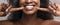 Unrecognizable black woman pointing at her healthy white teeth, closeup