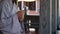 Unrecognizable buddhist monk praying in buddhist monastery