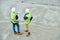 Unrecognizable building inspectors on construction site