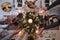 Unrecognizable couple indoors at home setting the table at Christmas, top view.