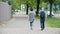 Unrecognizable couple walk along the street in Berlin