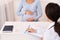 Unrecognizable Doctor Talking With Patient During Pregnancy Check-Up Visit Indoor