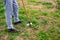 Unrecognizable farmer tilling the land in a farm