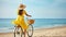 Unrecognizable female wearing broad brim straw hat biking on sandy sea shore on sunny day. Generative AI
