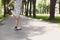 Unrecognizable fitness man stretching legs outdoors