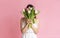 Unrecognizable Girl Covering Her Face With Bouquet Of Tulips