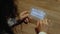 Unrecognizable Hands hold tablet with text Coronavirus