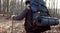 Unrecognizable hiker carrying backpack