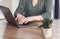 Unrecognizable Lady At Laptop Browsing Internet Working In Office, Cropped