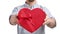 Unrecognizable man giving red heart gift box Valentine's Day romantic holiday isolated closeup