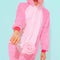 Unrecognizable Pink Pajamas Party Girl.  Lollipop lover. Minimal. Home Relax style. Kigurumi shop