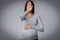 Unrecognizable Pregnant Lady Covering Face Gesturing Stop, Studio Shot