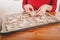 Unrecognizable woman showing homemade cookies