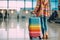 Unrecognizable woman with suitcase standing at the airport, Generative AI