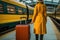 Unrecognizable woman with suitcase standing at the railway station, Generative AI