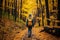 Unrecognizable woman walking in autumn forest, surrounded by vibrant foliage on nature trail