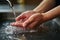 Unrecognizable womans hands in a close up, promoting cleanliness through handwashing