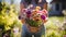 Unrecognizable young girl with basket of colorful Easter flowers in sunny garden